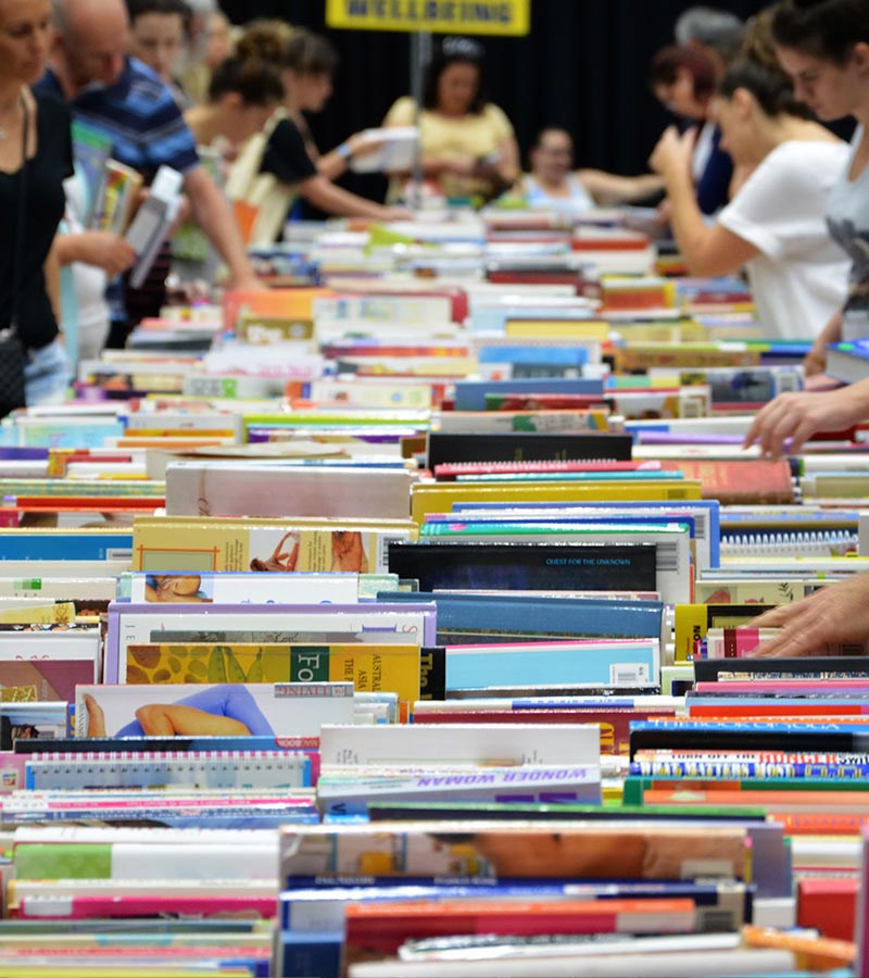 People looking through books at a bookfest