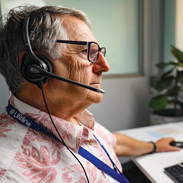 Older volunteer telephone crisis supporter on-call
